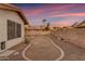 Backyard featuring desert landscaping and block fence, offering a private outdoor space at 4165 W Park Ave, Chandler, AZ 85226