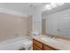 Bathroom featuring bathtub with shower, single vanity, toilet, and neutral color scheme at 4165 W Park Ave, Chandler, AZ 85226