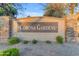 Attractive stone-and-stucco community sign marking the entrance to Corona Gardens at 4165 W Park Ave, Chandler, AZ 85226