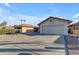 Single-story home with desert landscaping, and a front-facing two car garage at 4165 W Park Ave, Chandler, AZ 85226