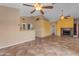 Open-concept living area with tile flooring, neutral walls, and access to kitchen area at 4165 W Park Ave, Chandler, AZ 85226