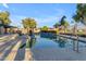 Community pool with a pergola and metal safety railing along the entrance steps at 4165 W Park Ave, Chandler, AZ 85226