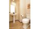 Chic powder room with pedestal sink, decorative mirror, and stylish fixtures for a modern touch at 4251 E Desert Forest Trl, Cave Creek, AZ 85331