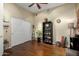 Bright bedroom features a ceiling fan, closet, hardwood floors, and nice furnishings at 4546 E Sierra Sunset Trl, Cave Creek, AZ 85331