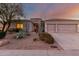 Charming single-story home showcasing a beautifully xeriscaped front yard and a spacious three-car garage at 4546 E Sierra Sunset Trl, Cave Creek, AZ 85331