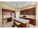 Lovely eat-in kitchen featuring a center island, stainless steel appliances, and plenty of cabinet space at 4546 E Sierra Sunset Trl, Cave Creek, AZ 85331