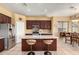 Kitchen featuring a large island with seating, stainless steel appliances, and ample cabinet space at 4546 E Sierra Sunset Trl, Cave Creek, AZ 85331