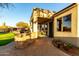 An outdoor kitchen and patio create a perfect space for dining or grilling near lush landscaping at 4546 E Sierra Sunset Trl, Cave Creek, AZ 85331