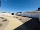 Backyard featuring gravel ground cover, desert plants, and walking path at 4836 W Redfield Rd, Glendale, AZ 85306