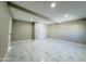 Bright bedroom featuring marble floors and ample space for relaxation and rest at 4836 W Redfield Rd, Glendale, AZ 85306