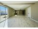 Spacious living room featuring marble floors and an open floor plan with plenty of light at 4836 W Redfield Rd, Glendale, AZ 85306