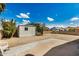 Spacious backyard with a storage shed, offering a private outdoor space for recreation and relaxation at 485 S Pino Cir, Apache Junction, AZ 85120