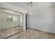 Bright bedroom features a mirrored closet, allowing for lots of storage space and natural light at 485 S Pino Cir, Apache Junction, AZ 85120