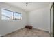 Simple bedroom features a large window that provides lots of natural light at 485 S Pino Cir, Apache Junction, AZ 85120