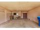 Attached carport featuring a textured ceiling, access to storage, and direct entry to the home at 485 S Pino Cir, Apache Junction, AZ 85120