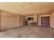 Attached carport featuring textured ceiling, access to storage, and direct entry to the home at 485 S Pino Cir, Apache Junction, AZ 85120