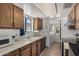 Kitchen featuring wooden cabinets, tile flooring, and stainless steel appliances at 485 S Pino Cir, Apache Junction, AZ 85120