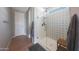 Beautiful bathroom featuring a glass shower with white subway tile and decorative backsplash at 5121 N 181St Dr, Litchfield Park, AZ 85340