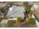 Aerial view of home with a light gray roof and yellow exterior at 5907 N Azalia St, Casa Grande, AZ 85122