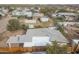 A view of the property, roof, outbuildings, and a portion of the community at 5907 N Azalia St, Casa Grande, AZ 85122