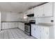 Bright kitchen with stainless steel appliances and ample cabinet space for storage at 5907 N Azalia St, Casa Grande, AZ 85122