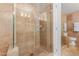 Modern bathroom with travertine walls and glass shower at 7161 E Rancho Vista Dr # 2015, Scottsdale, AZ 85251