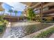 Courtyard water feature with landscaping, creating a serene and inviting atmosphere at 7161 E Rancho Vista Dr # 2015, Scottsdale, AZ 85251