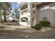 Beautiful exterior view showcasing architectural details, landscaping, and a welcoming entrance at 8653 E Royal Palm Rd # 1033, Scottsdale, AZ 85258