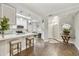 Bright, open kitchen featuring a breakfast bar, pendant lighting and hardwood floors at 8653 E Royal Palm Rd # 1033, Scottsdale, AZ 85258