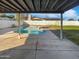 Covered patio overlooking the backyard swimming pool at 909 W Danbury Rd, Phoenix, AZ 85023