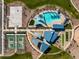 Aerial view of community recreational facilities including a basketball court and swimming pool at 917 W Macaw Dr, Queen Creek, AZ 85140