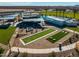 Community recreational area featuring bocce ball, cornhole, and a covered seating area at 917 W Macaw Dr, Queen Creek, AZ 85140