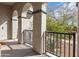 Inviting covered patio showcasing arched columns and offering views of the desert landscape at 9266 E Desert Village Dr, Scottsdale, AZ 85255