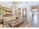 Bright and airy living room with high ceilings, decorative chandelier, and stylish decor at 9266 E Desert Village Dr, Scottsdale, AZ 85255