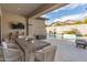 Inviting outdoor space with a dining area and swimming pool, perfect for entertaining or relaxing at 9266 E Desert Village Dr, Scottsdale, AZ 85255