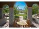 Covered patio features an outdoor dining area with mountain views at 9266 E Desert Village Dr, Scottsdale, AZ 85255