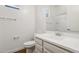 Modern bathroom featuring a new vanity with sleek hardware and fixtures at 942 E Paseo Way, Phoenix, AZ 85042