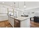 Spacious kitchen featuring granite island, stainless steel appliances, and a pantry at 942 E Paseo Way, Phoenix, AZ 85042