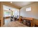 Bonus room featuring tile flooring, ceiling fan, small window, and comfortable seating at 9513 W Cottonwood Dr, Sun City, AZ 85373