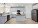 Updated kitchen featuring stainless steel appliances, light grey cabinets and a butcher block island at 1015 E Pasture Canyon Dr, San Tan Valley, AZ 85143