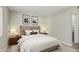 Comfortable bedroom with a neutral color palette, carpet flooring, and ample natural light at 1016 E Utopia Rd, Phoenix, AZ 85024
