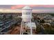 Iconic water tower in Gilbert, Arizona, set against a vibrant sunset skyline at 102 W Washington Ave, Gilbert, AZ 85233