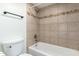 Bathroom featuring a tiled shower-tub combination, complemented by modern fixtures for a comfortable and functional space at 10610 S 48Th St # 2001, Phoenix, AZ 85044