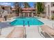 Beautiful community pool area featuring plenty of seating and shaded cabana at 10610 S 48Th St # 2001, Phoenix, AZ 85044