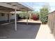 Backyard featuring large covered patio, mature desert landscaping and gravel at 10621 N 115Th Ave, Youngtown, AZ 85363