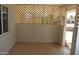 Inviting covered porch with lattice siding offering privacy and shade at 10621 N 115Th Ave, Youngtown, AZ 85363