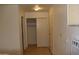 Hallway with closet, doorway and air conditioning unit at 10621 N 115Th Ave, Youngtown, AZ 85363