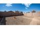 Low maintenance backyard with gravel and block fence at 10851 E Clovis Ave, Mesa, AZ 85208