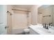 Clean bathroom with a shower-tub combo, white fixtures, and a vanity with ample counter space at 10851 E Clovis Ave, Mesa, AZ 85208