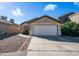 Charming single-story home with a two-car garage, low maintenance landscaping, and a cozy facade at 10851 E Clovis Ave, Mesa, AZ 85208